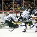 Michigan State goaltender Jake Hildebrand looks over his shoulder as a puck goes in the net at Joe Louis Arena on Saturday, Feb. 2. Daniel Brenner I AnnArbor.com